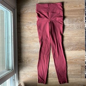 Lululemon leggings size 4 color red.